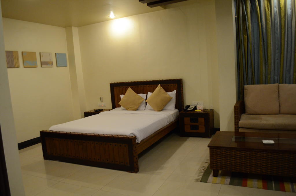 Hotel The Elite Suites Пюн Стая снимка